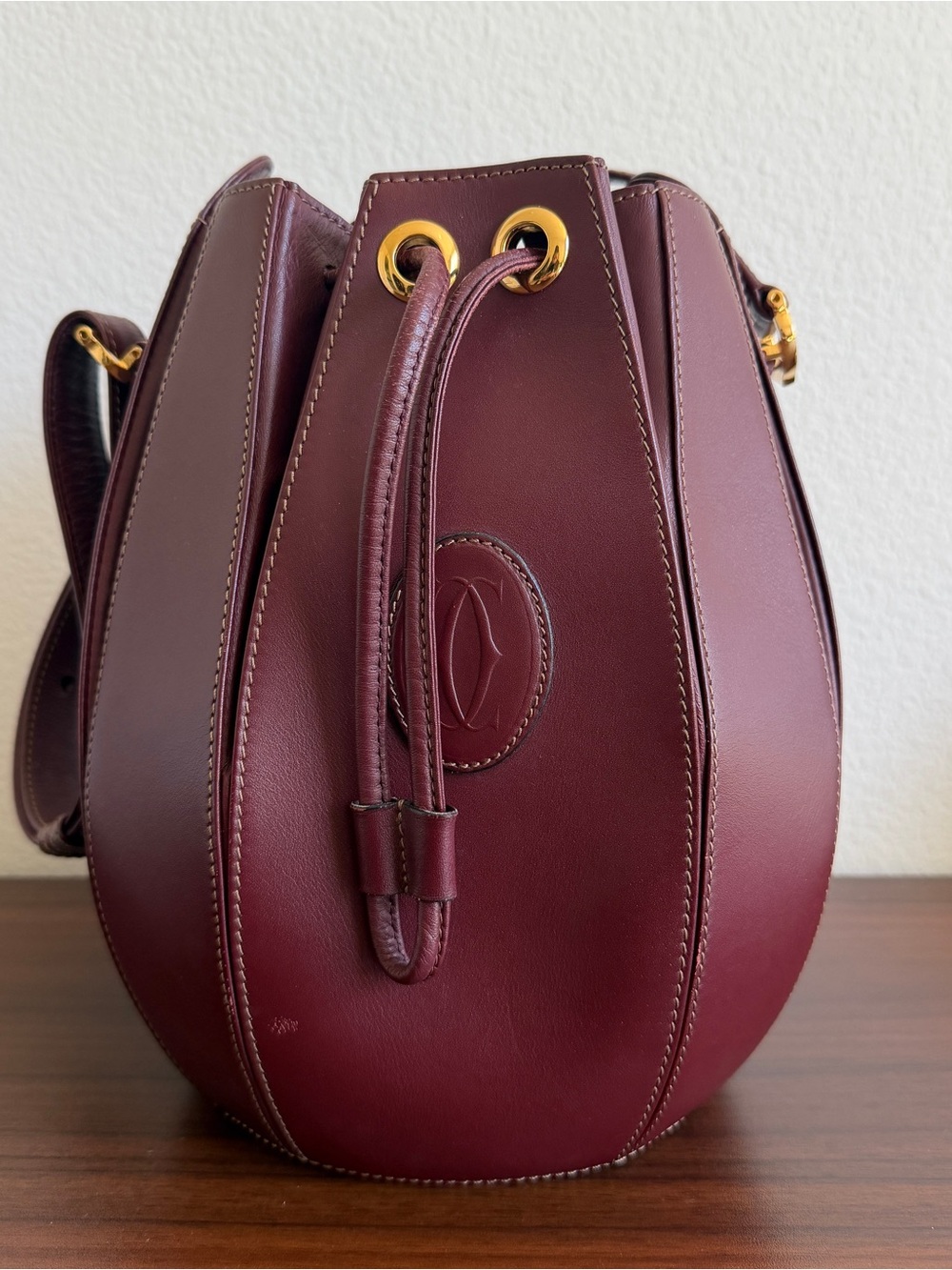 Leather Cartier Drawstring Bucket Bag in Deep Burgundy